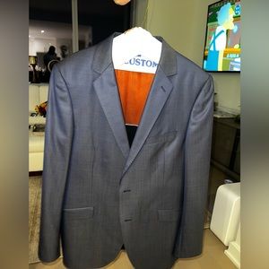 Sarar suit with pants. Jacket and pants 42R. Dry cleaned and shipped in suit bag